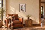 Cowgirl Boot in a bedroom sitting area; illustrative framing and approximate scale