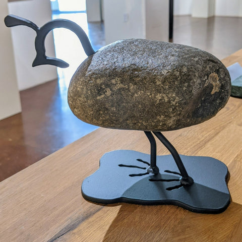 Lory - Fieldstone and Iron Sculpture by artist Charles Adams and Thomas Widhalm